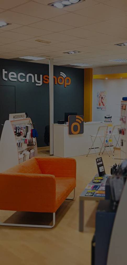 Interior de punto de venta de franquicia Tecnyshop