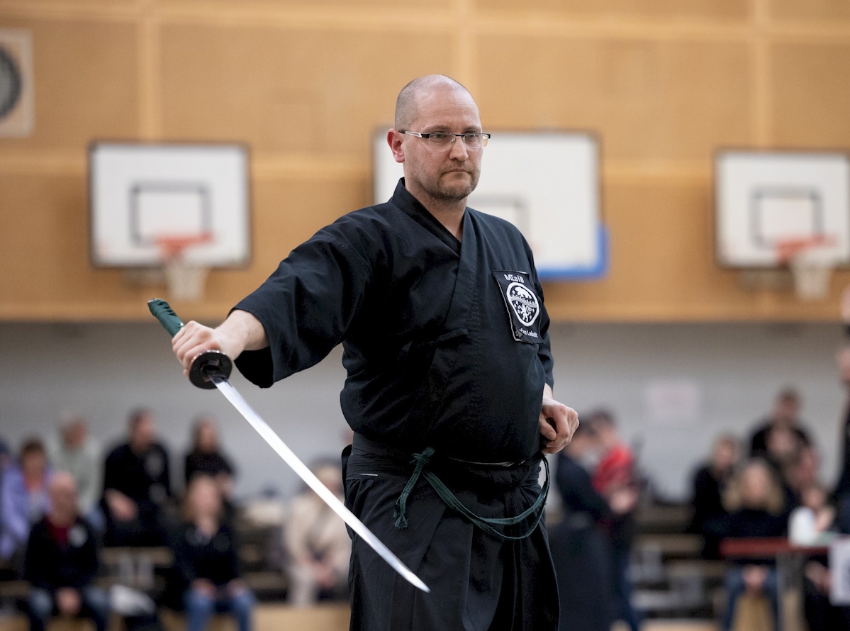 Zwei Personen beim Brazilian Jiu-Jitsu Training